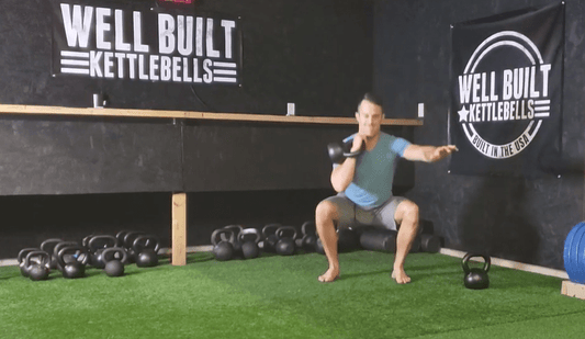 Kettlebell Single Arm Thrusters
